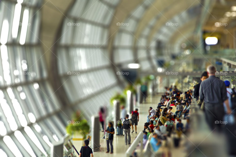 People waiting for boarding at the airport. ready for boarding the crowd is waiting. Tilt-shit effect