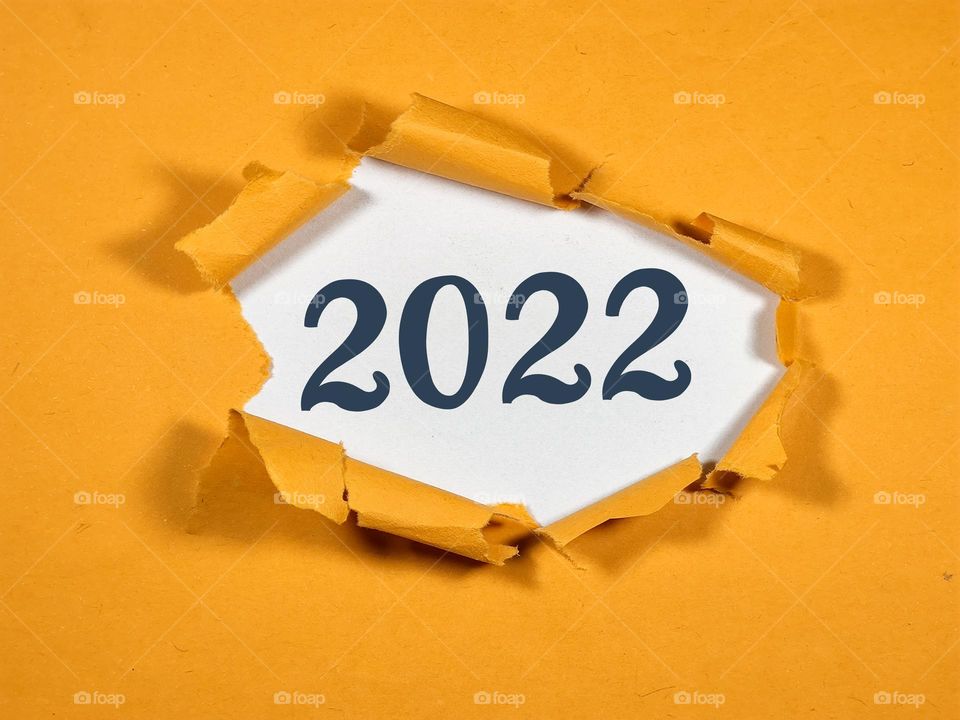 2022 HAPPY NEW YEAR. 2022 written on gift box. new year and new opportunities concept.