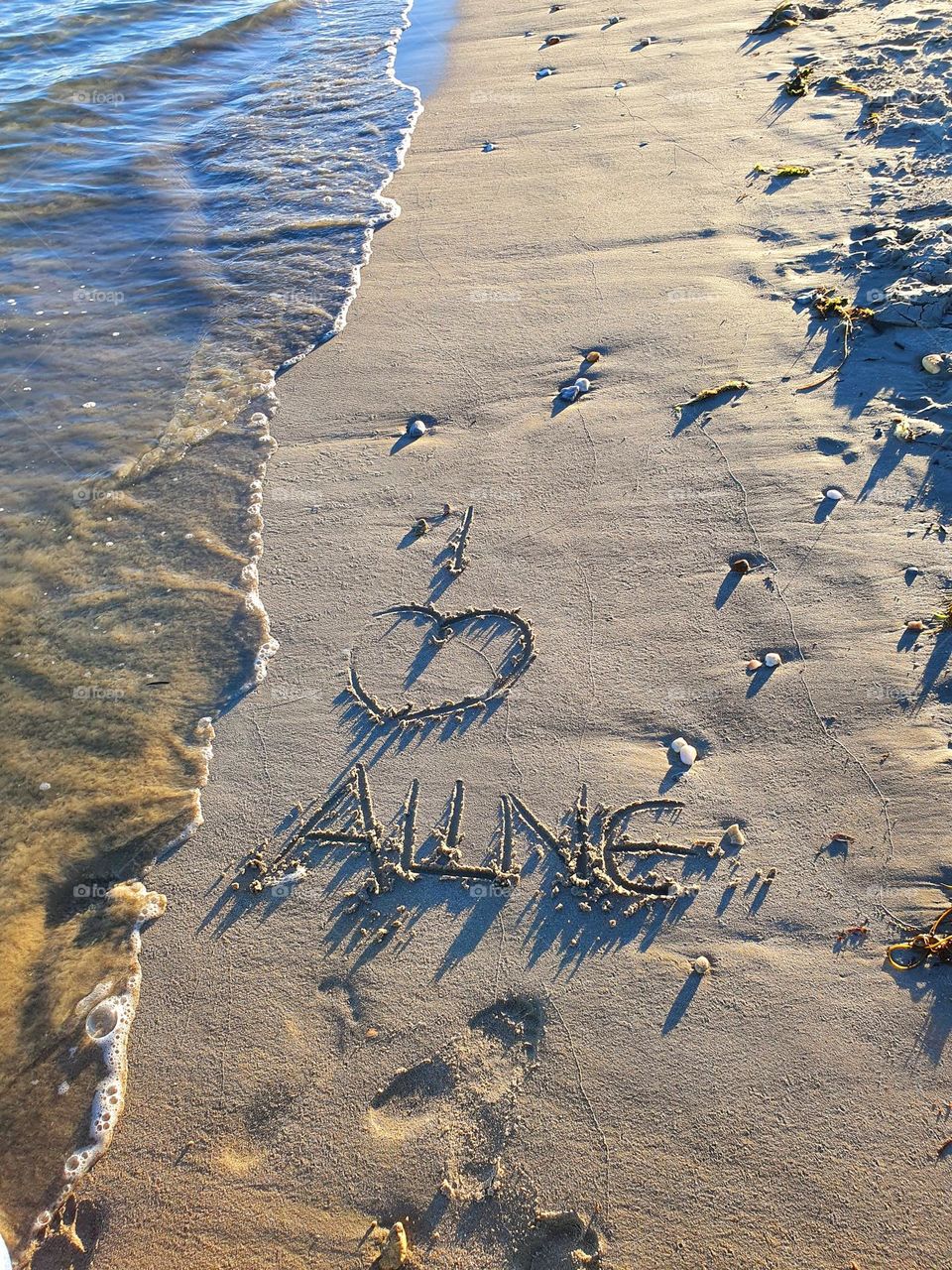 Love message in the sand on Gâvres beach