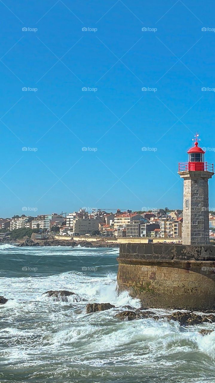 Faro en playas de Oporto