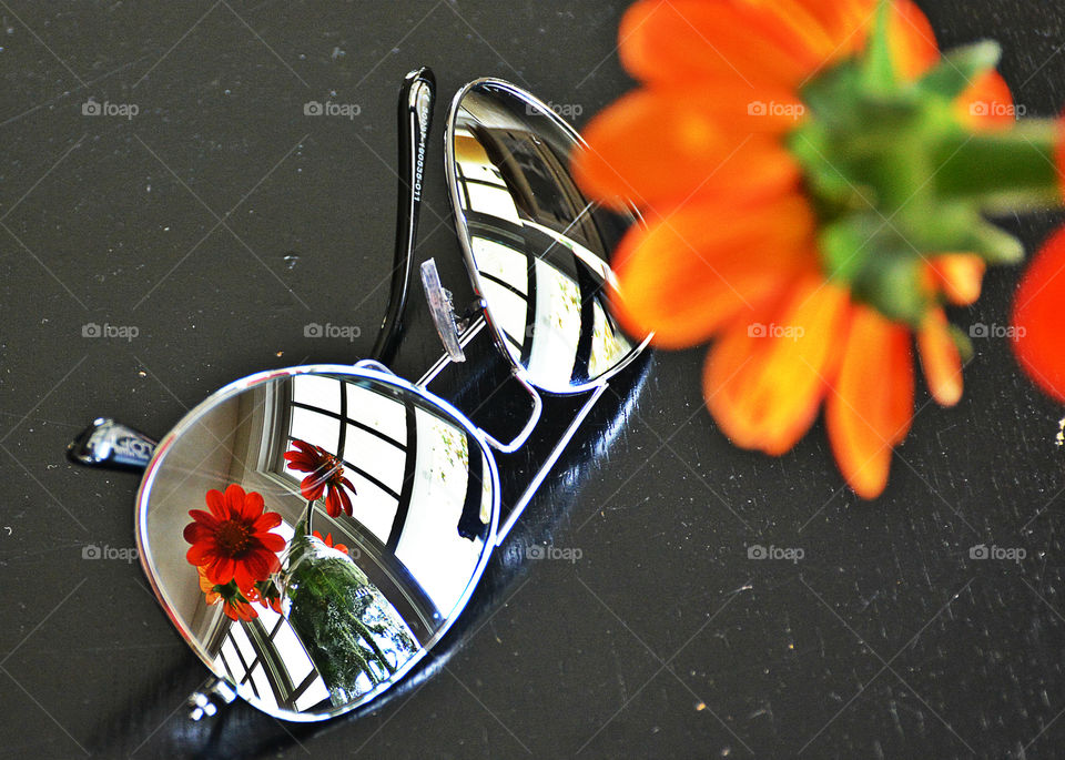 Mexican Sunflower reflected off mirror reflection of sunglasses!