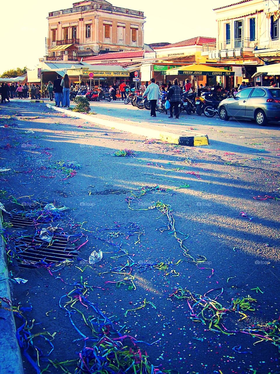 Leftover streamers and confetti after a Dionysian festival on a Greek isle