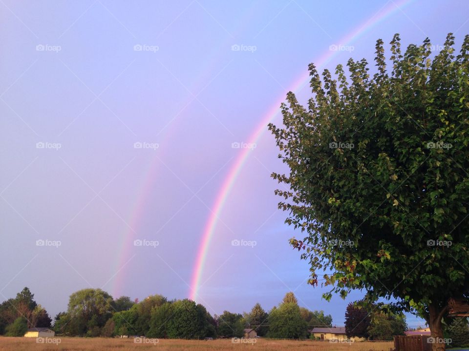 Double rainbow. Double rainbow in the evening