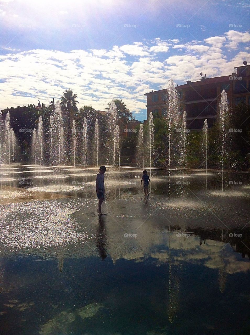Playing in the fountains