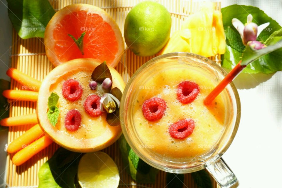 Fresh Fruit Smoothie -Jackfruit minty Smoothie - carrots,  grapefruit, mints   topped with raspberries