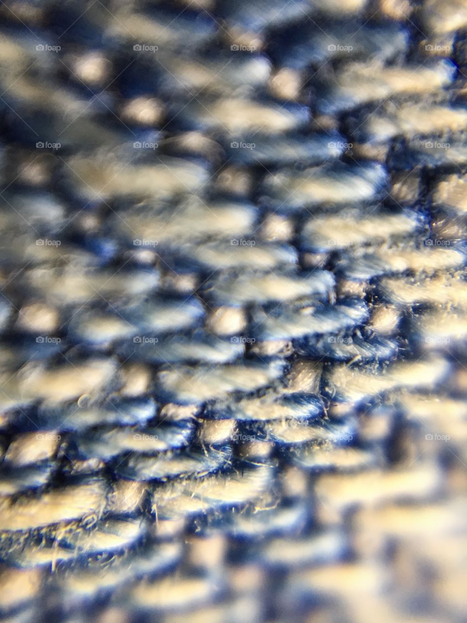 Jeans micro texture by microscope lens kit with smarth phone