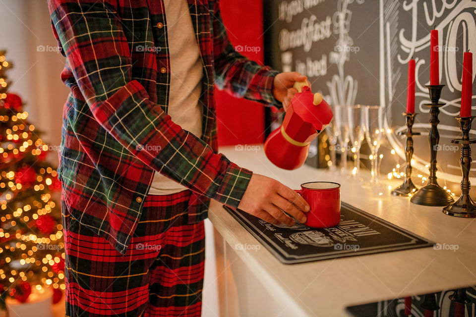 cup of coffee in a cozy festive Christmas atmosphere