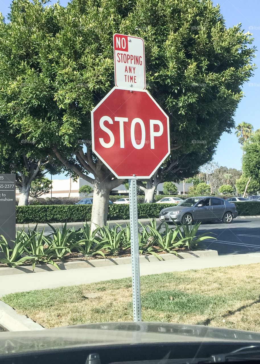 No Stopping Any Time : STOP - Signs With Conflicting Instructions