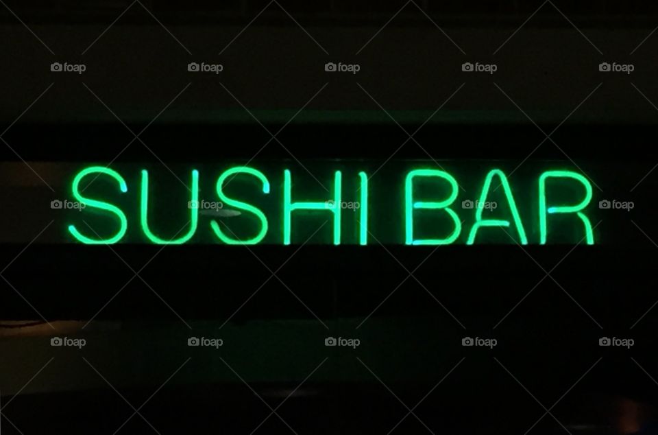 Sushi bar green neon sign