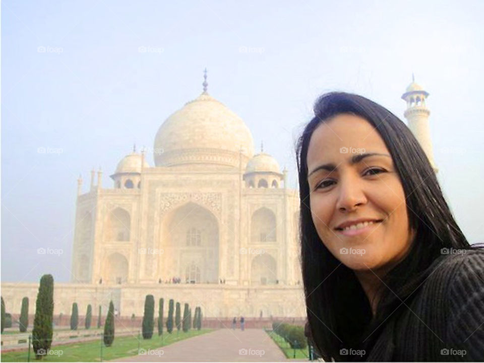 Female tourist taking selfie at Taj Mahal, Agra