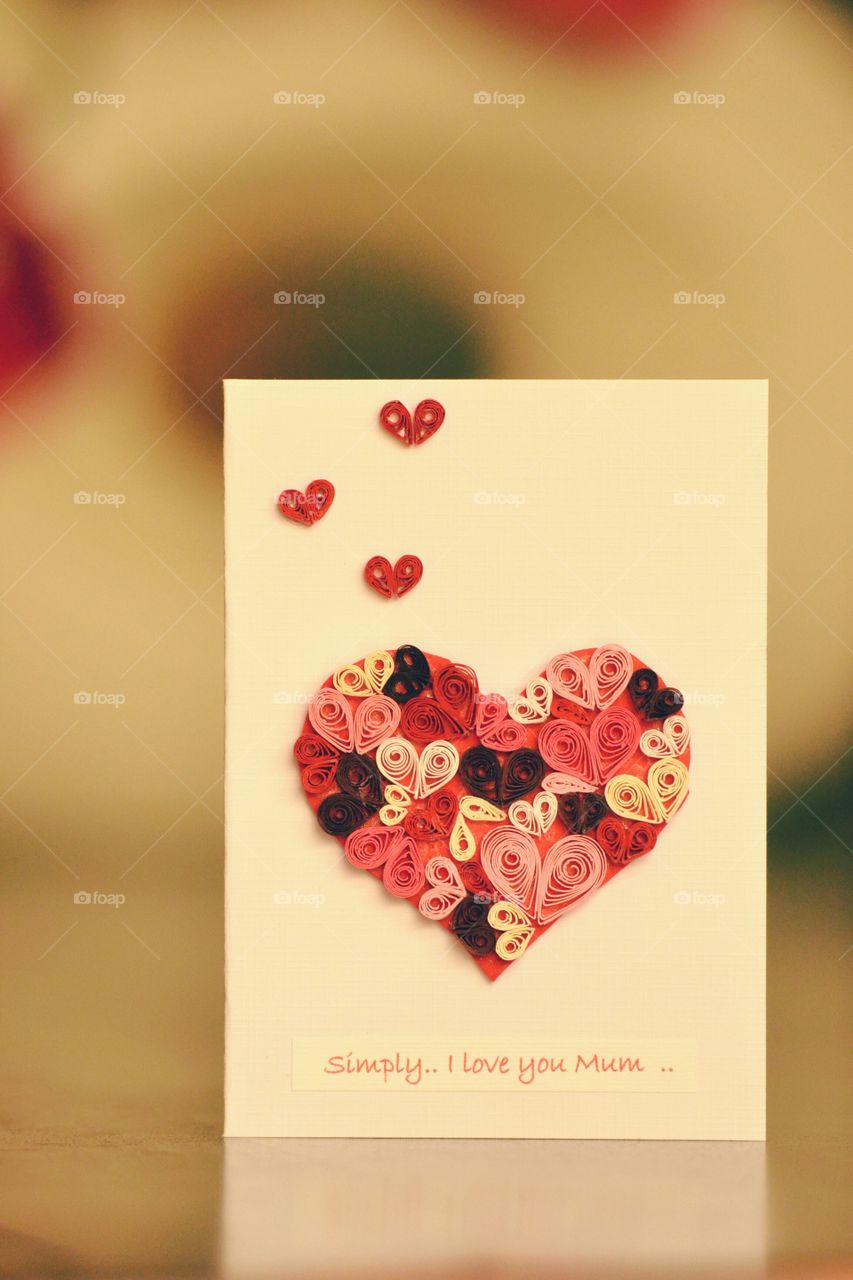 mother's day card with a beautiful heart shape made of paper