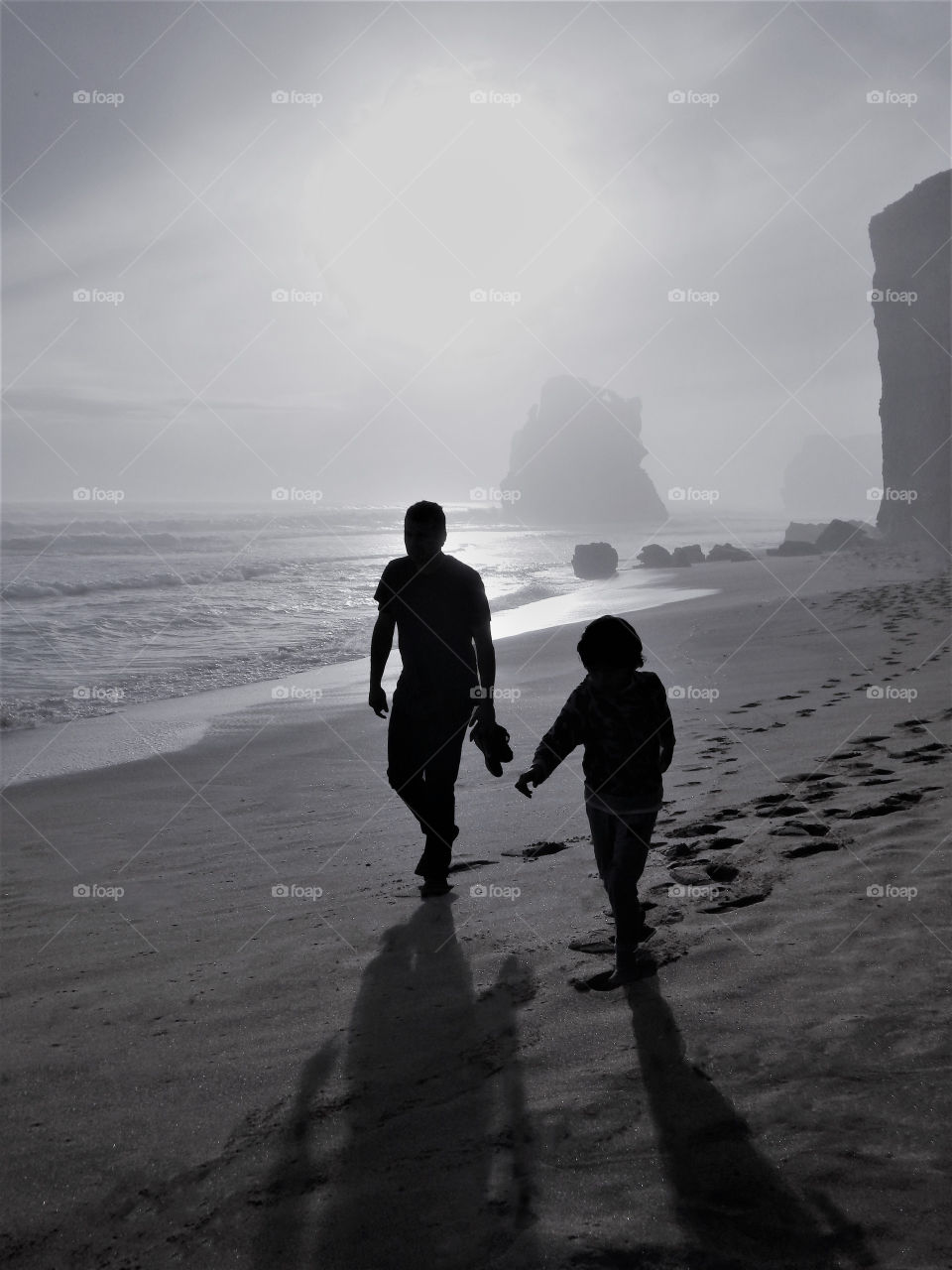Dad and son silhouettes