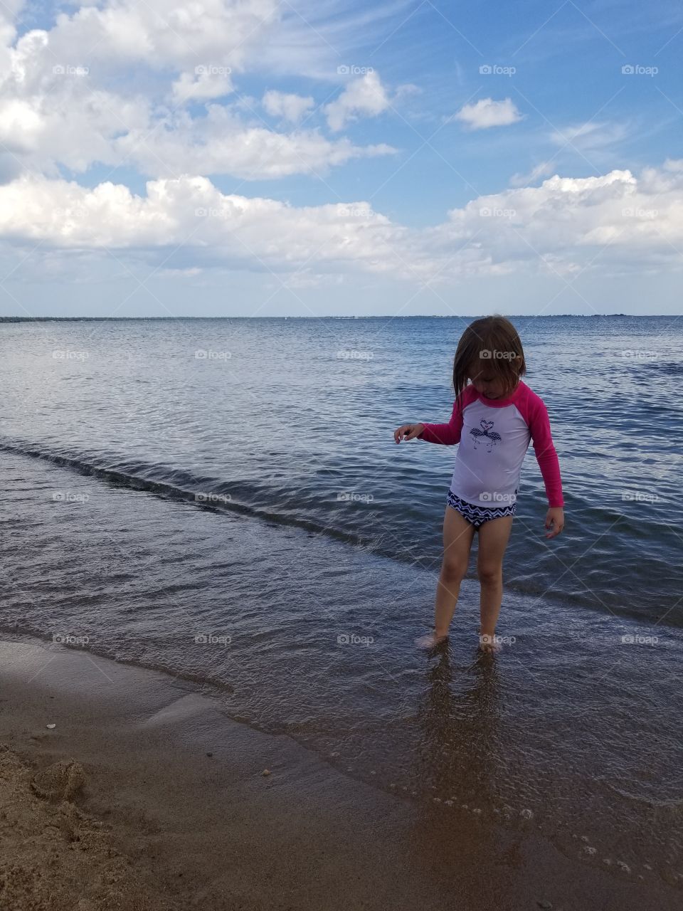 Dipping toes in Lake Michigan