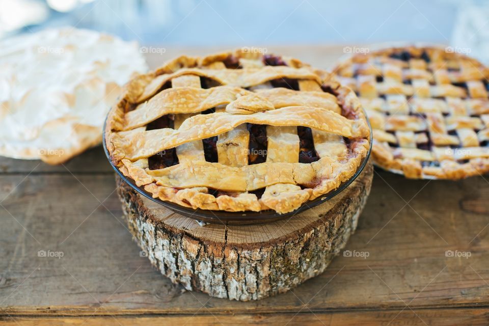 Three berry pies on display