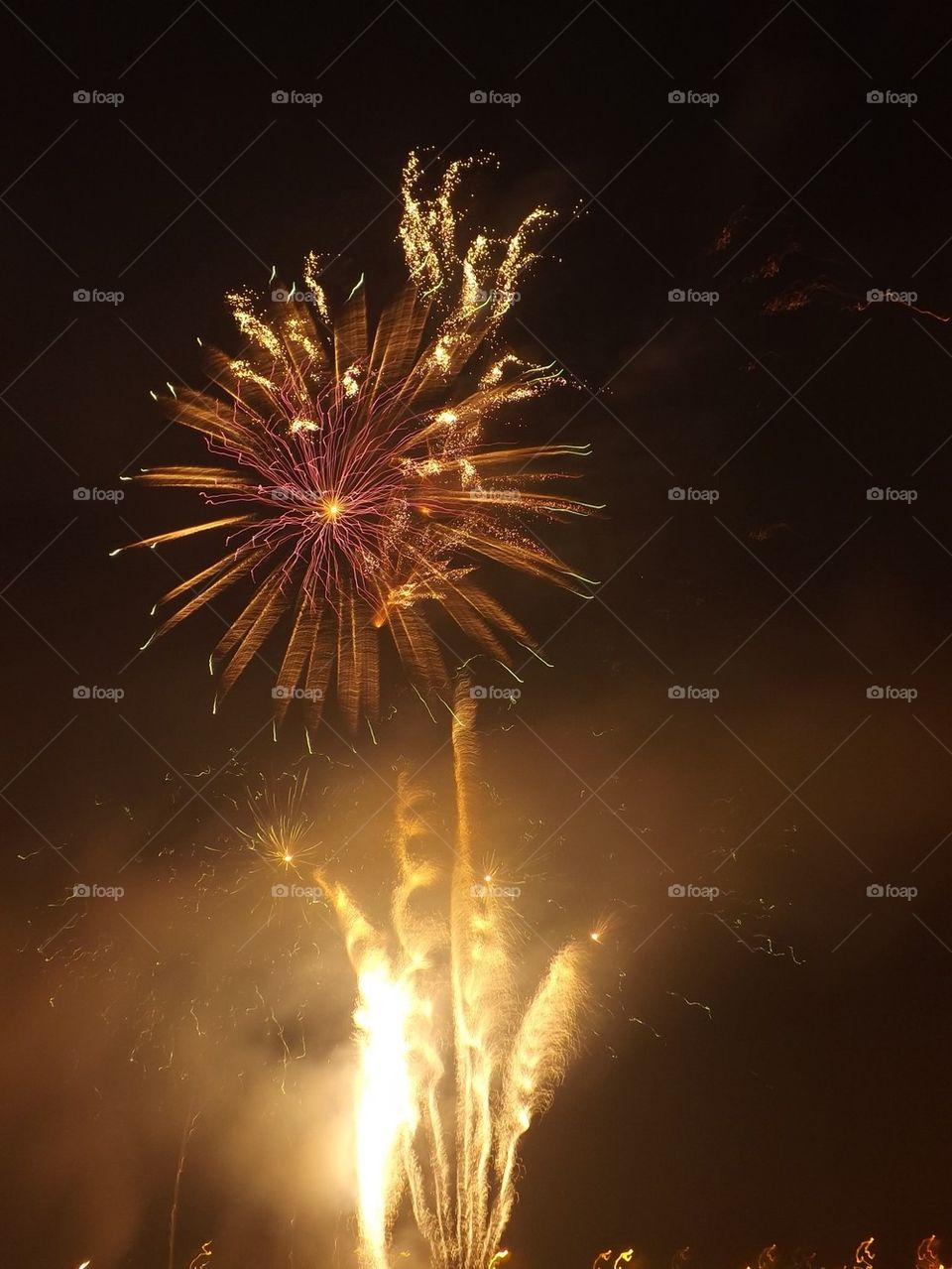 Firework display at night