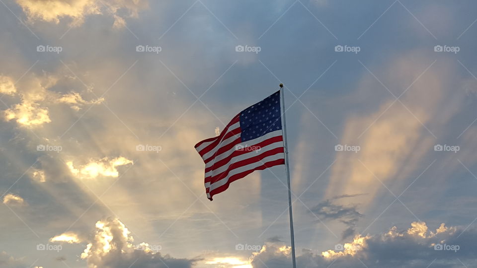American flag. American flag with a beautiful sunset backdrop