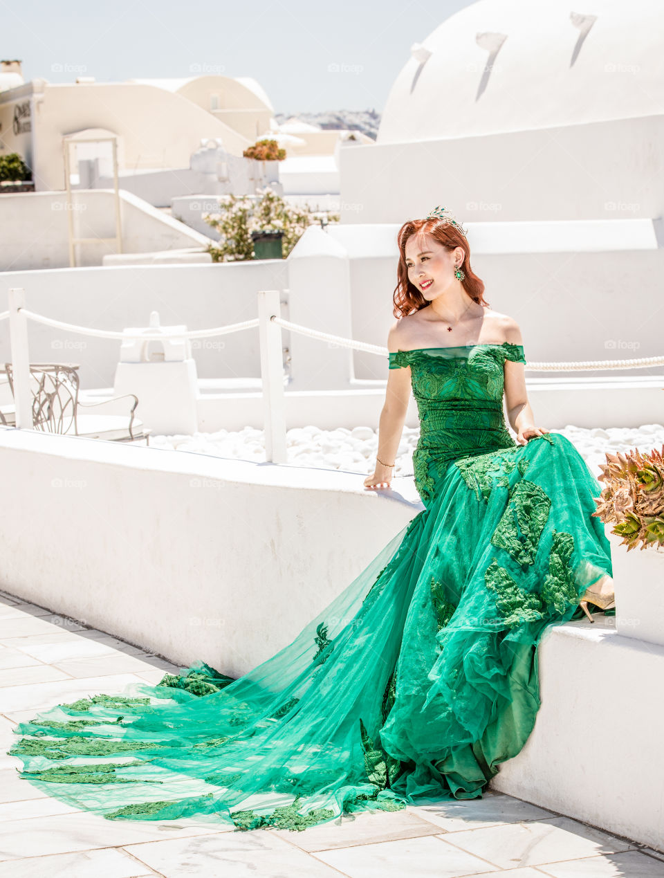 Beautiful Bride On Green Wedding Dress On Famous Greek Island Santorini
