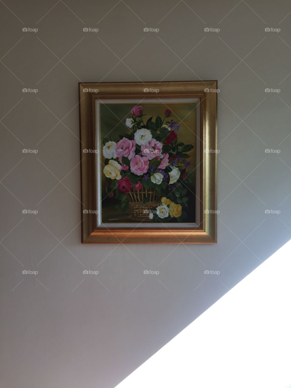 Painting in Gold Frame on a sunny wall