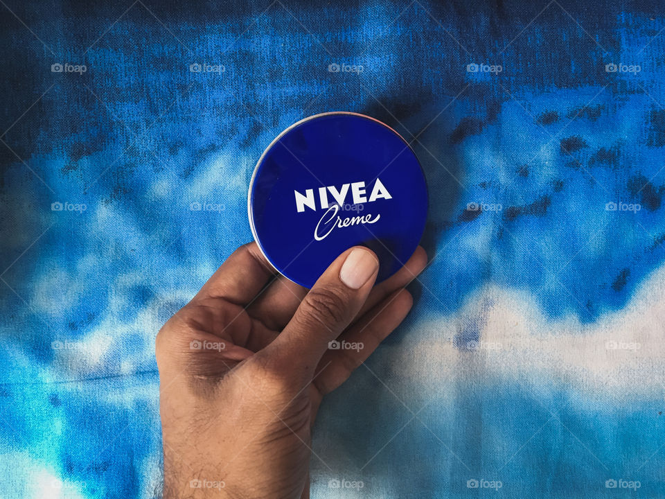 Nivea creme in the hands 