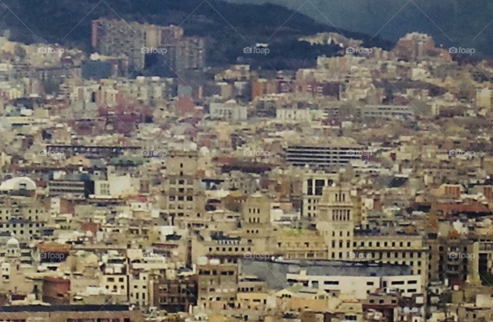A sweeping view of merely a fraction of the beautiful city of Barcelona, Spain. 