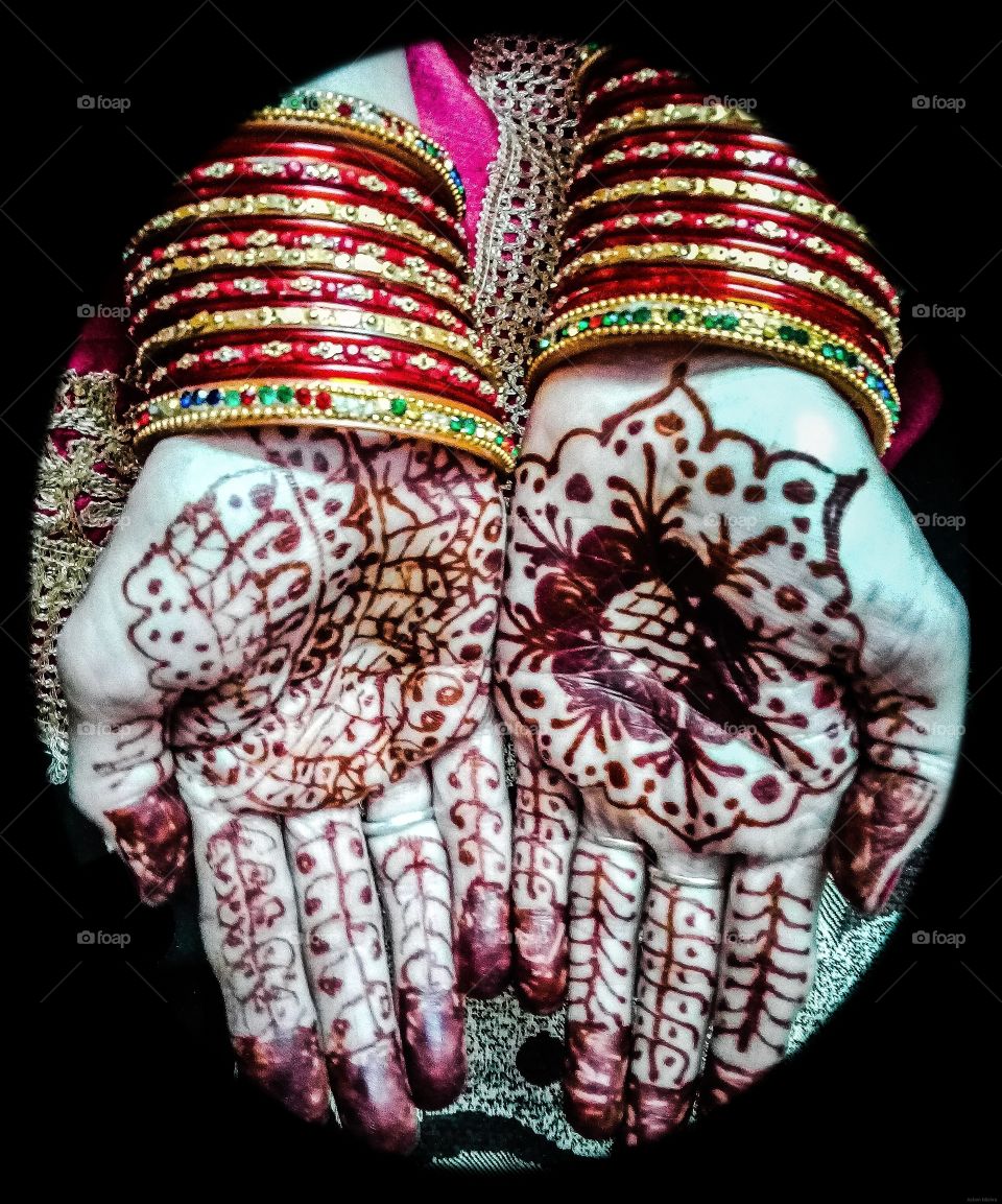 Mehndi / Heena design on Indian women's hand. Karva chauth is most important festival for all married women. They keep very hard fast for whole day without water and food for the safety and long life of their husband.