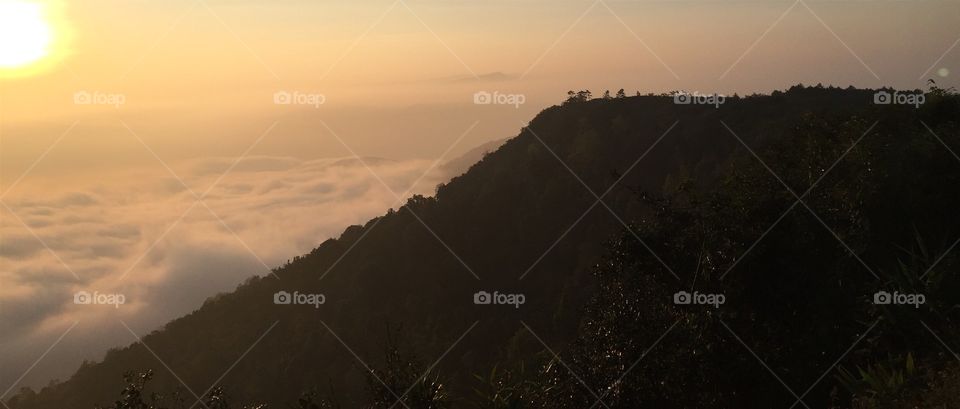 Beautiful sunrise, sunlight, sunset, mountain and soft cloud for background.