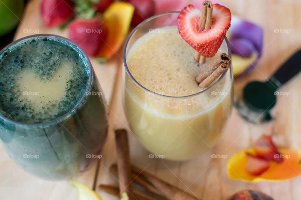 Fresh fruit smoothies with hearts shape strawberry