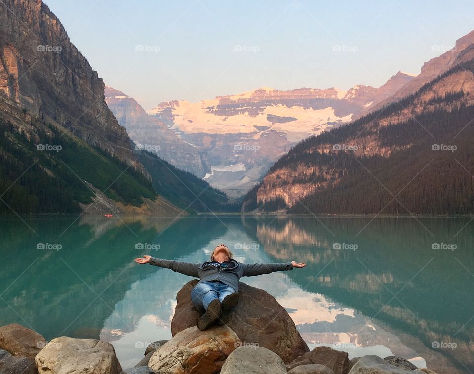 Freedom of summer and loving every moment of an early morning at Lake Louise in Banff National Park in Alberta, Canada 