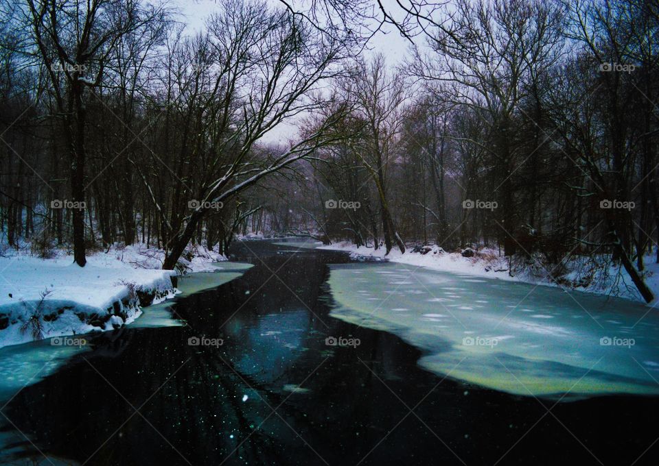 when hiking in winter I saw this beautiful half frozen over river 