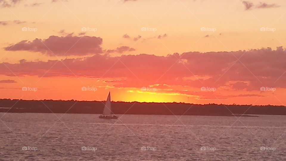 sailboat in sunset. sailboat  in harbir during sunset