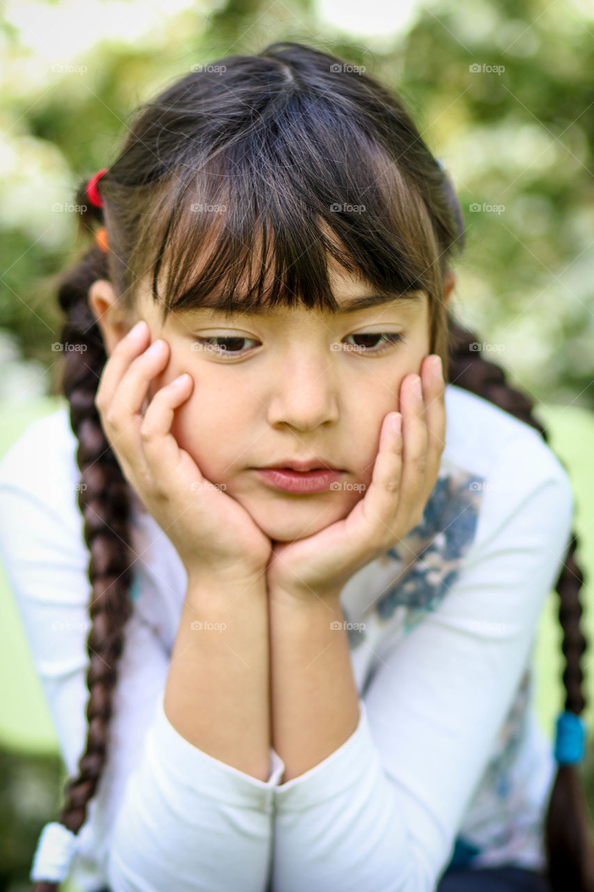 Cute girl thinking