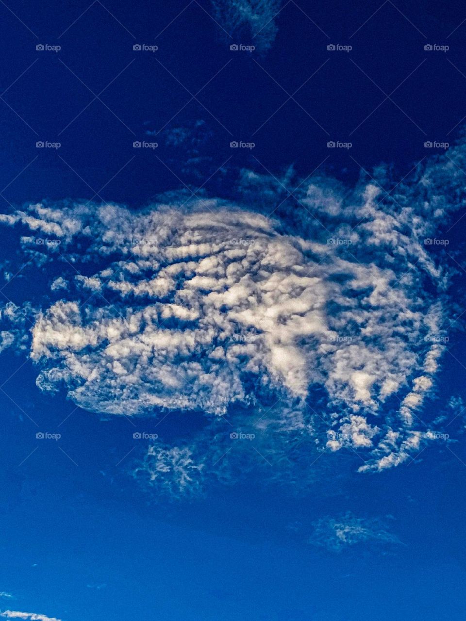 I want to show white clouds and blue sky in this photo.  The sky looks very beautiful with clouds and blue sky.