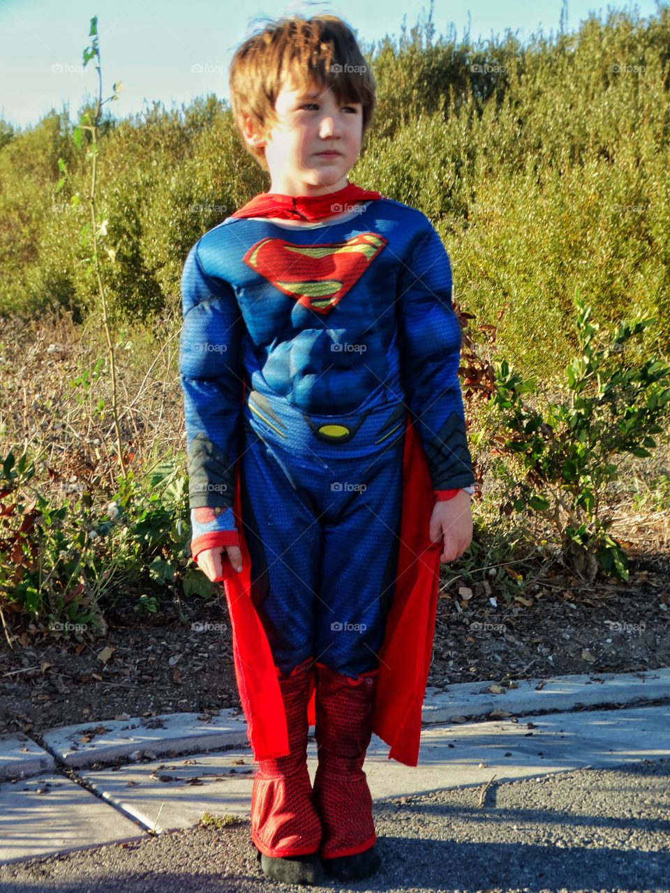 Young Boy In Superhero Costume
