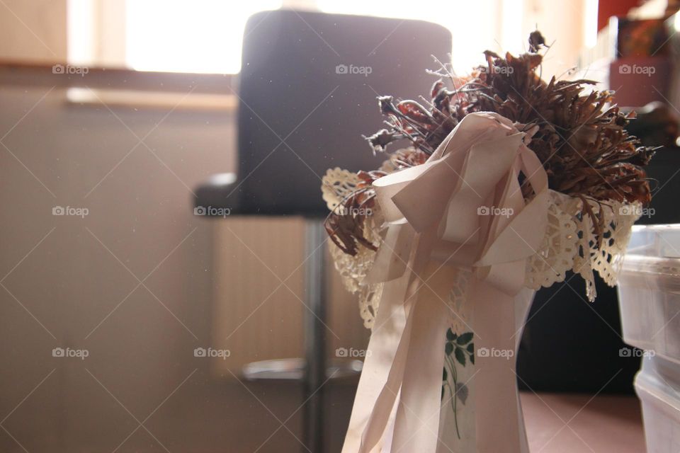 Close up of flowers in a vase in the office 