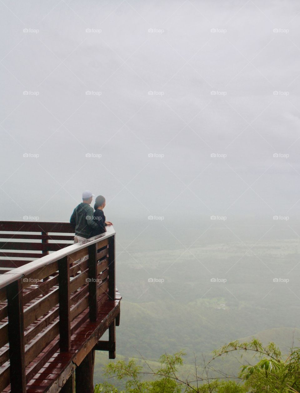 Couple and mist at valley