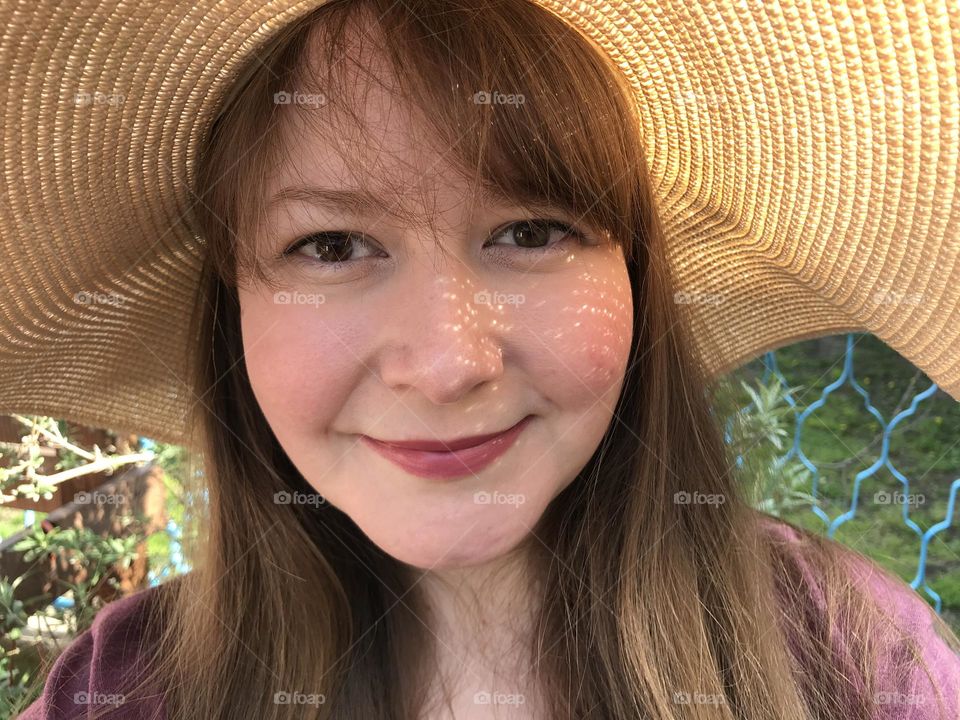 Close up of a girl in a hat