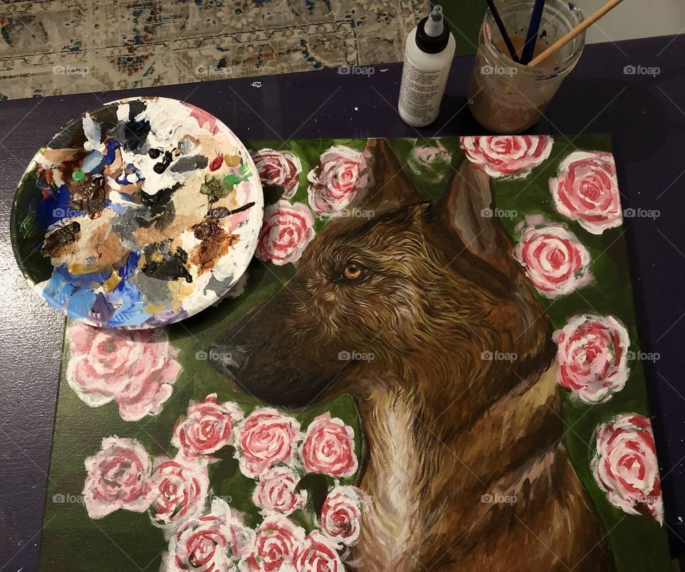 Painting of a dog in front of a bunch of roses! 