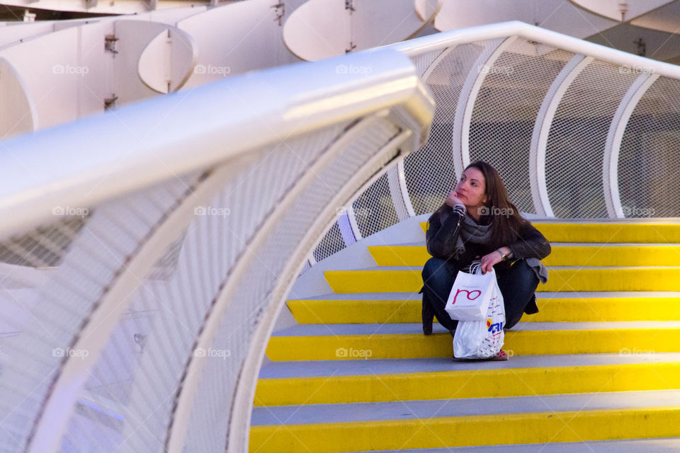 Yellow . Girl on stairs 
