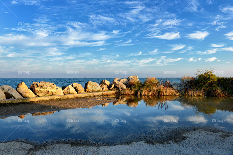 the cloud reflections on the sea background