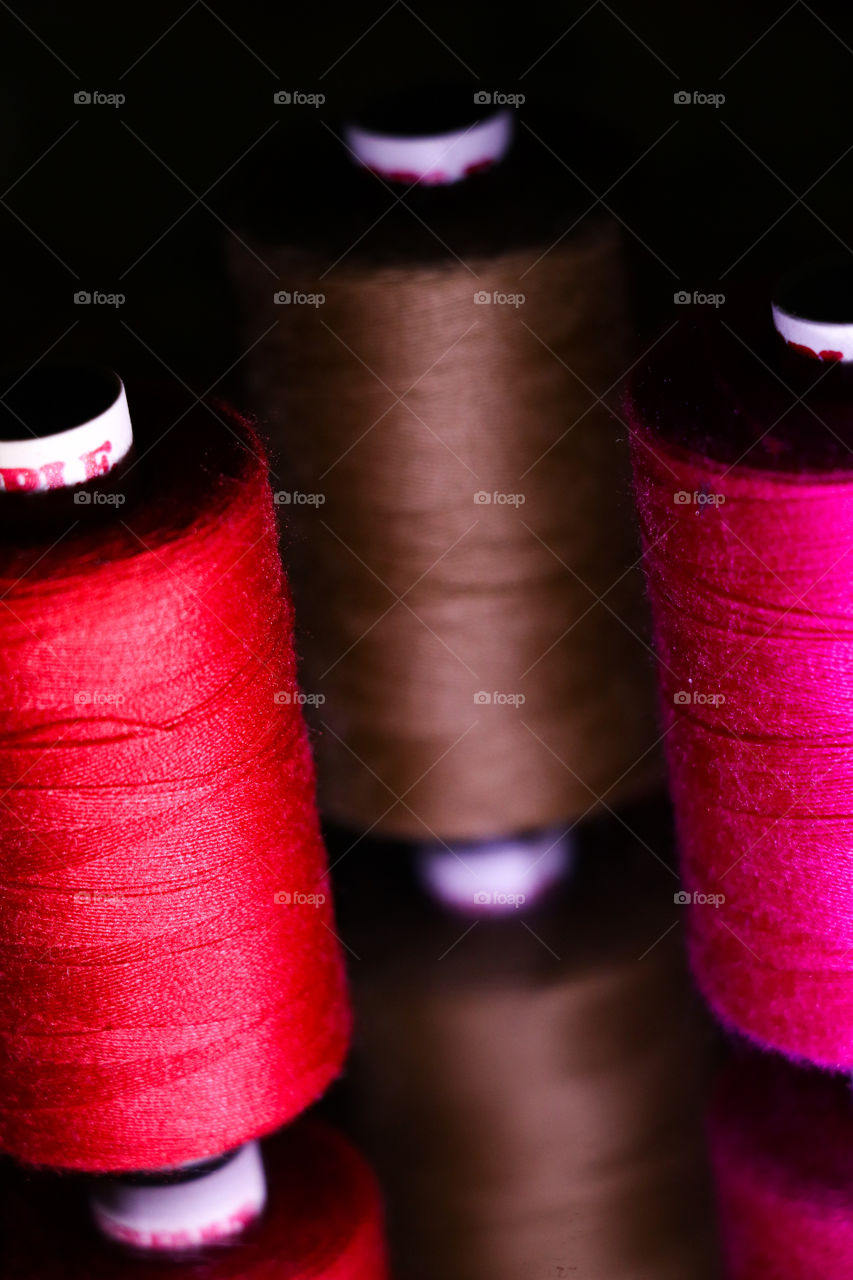 Red,pink brown threads