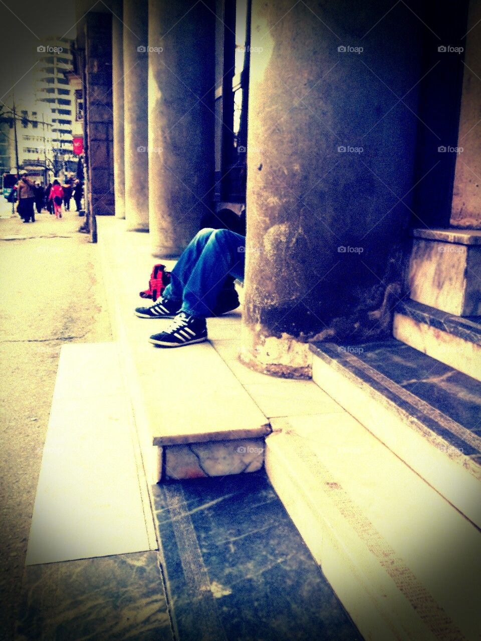 boy and girl waiting for bus