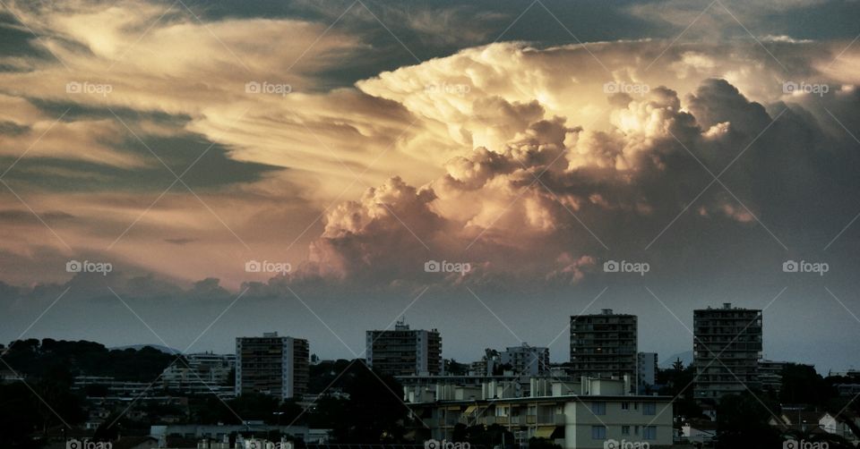 View of city against cloudscape