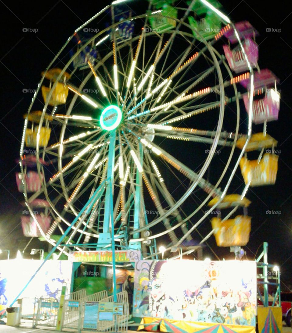 Wagner's Carnival Family Fun featuring Ferris Wheel neon lights Nighttime Excitement