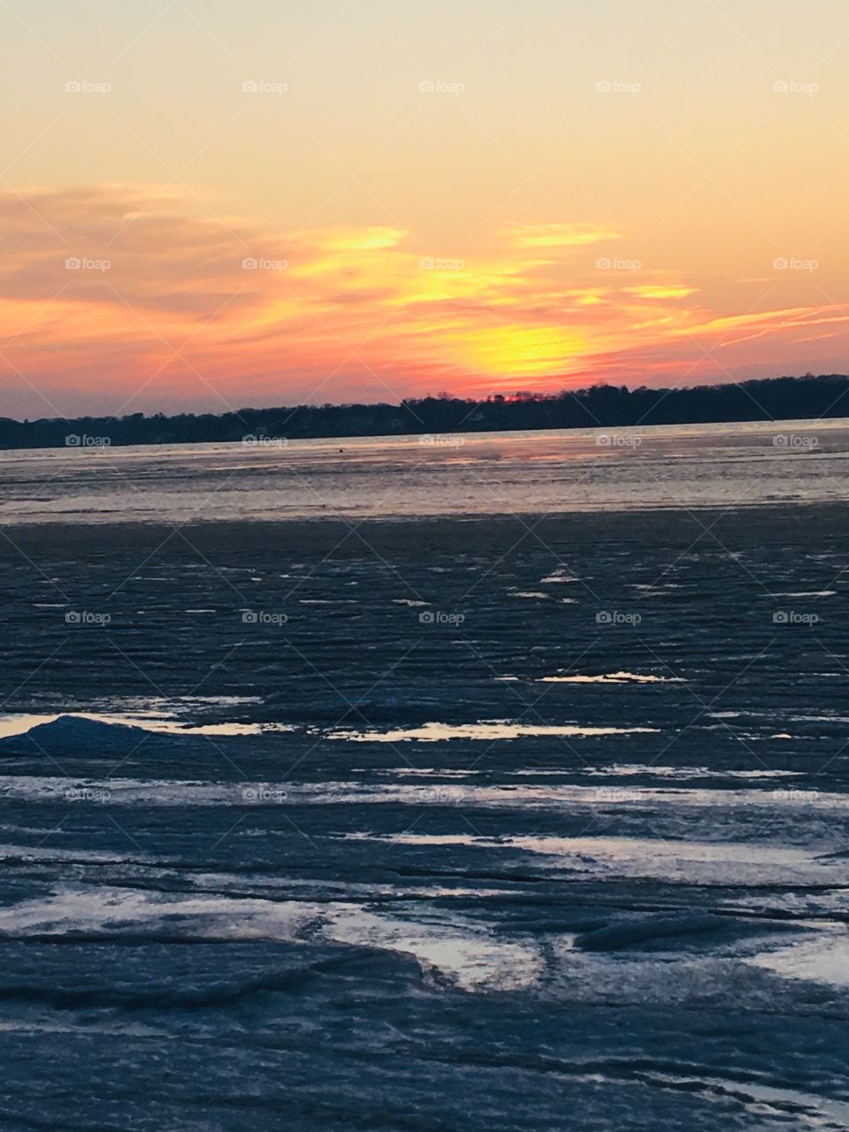 Sunset on a frozen ocean