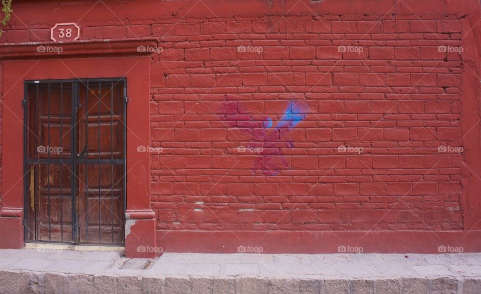 A colorful red dwelling in San Miguel de Allende, Mexico.
