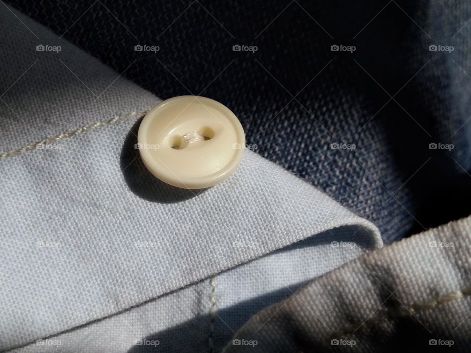 closeup of a button of clothes