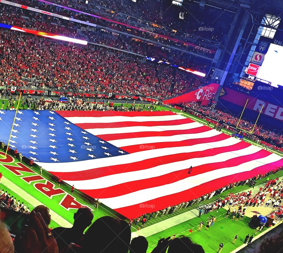 U. S. Flag at Football Game
