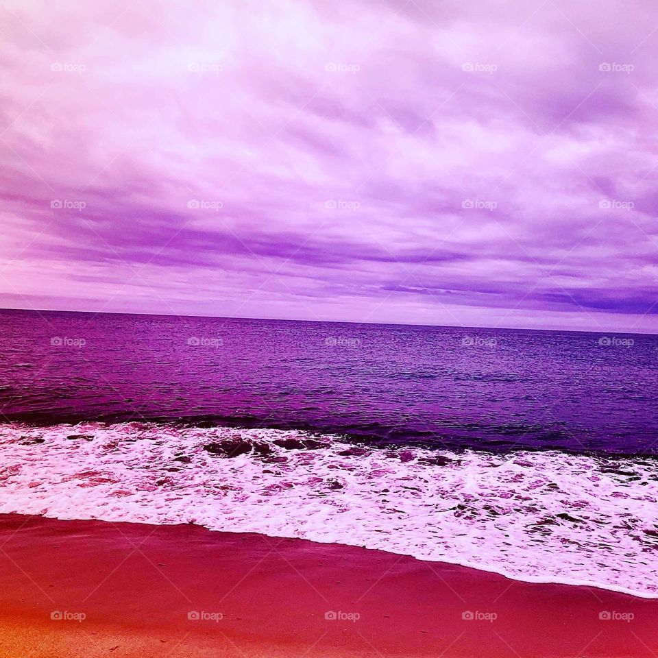Vacation day at the beach with purple tint photo
