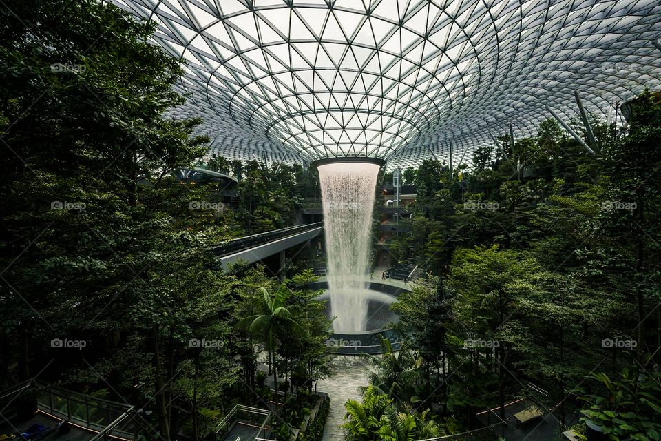 HSBC Rain Vortex, the world largest indoor waterfall, at Jewel Changi Airport in Singapore.