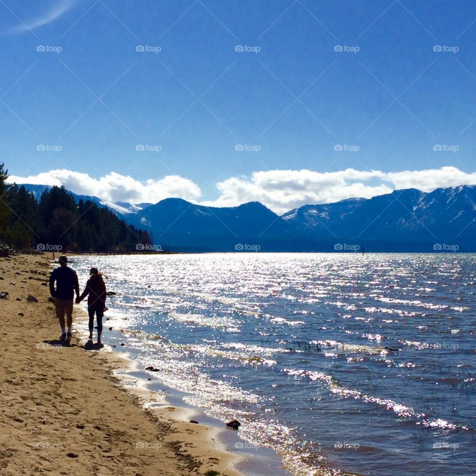 Couple walking on the beach